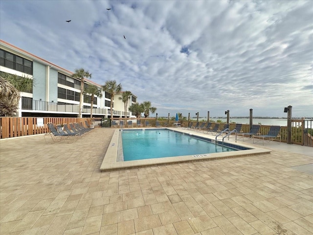 view of pool featuring a patio