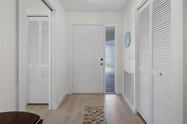 entryway featuring light wood-type flooring