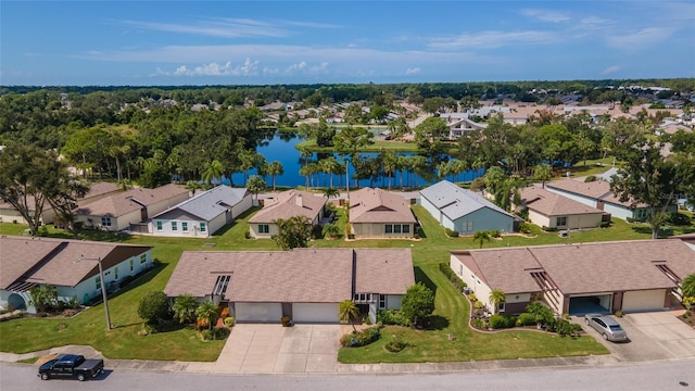 drone / aerial view featuring a water view