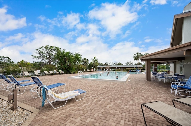 view of swimming pool featuring a patio area