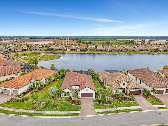 drone / aerial view with a water view