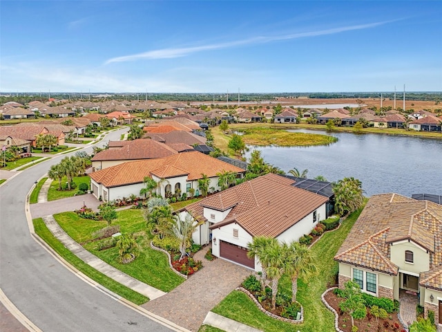 drone / aerial view with a water view