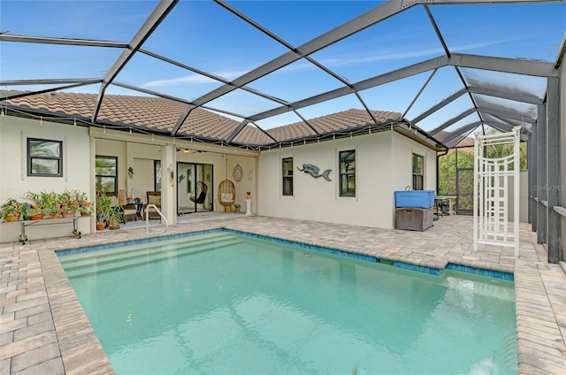 view of pool featuring a patio area and a lanai