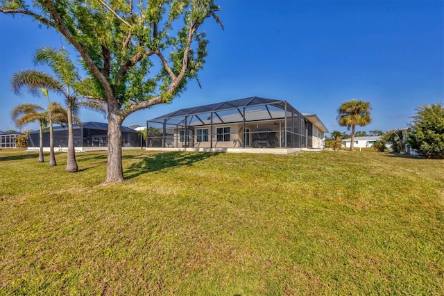 view of yard with a lanai