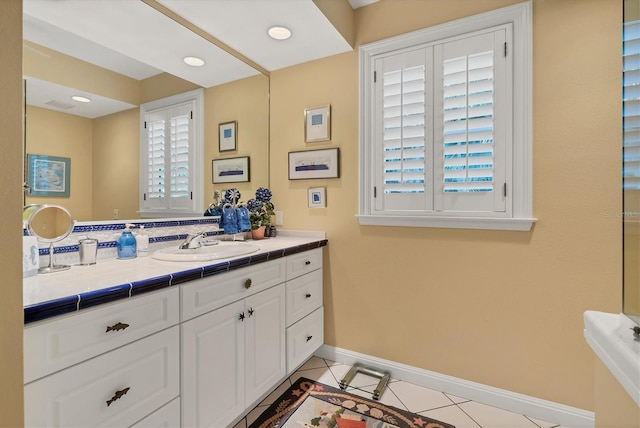 bathroom featuring vanity and tile patterned floors