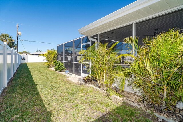 view of yard featuring a lanai