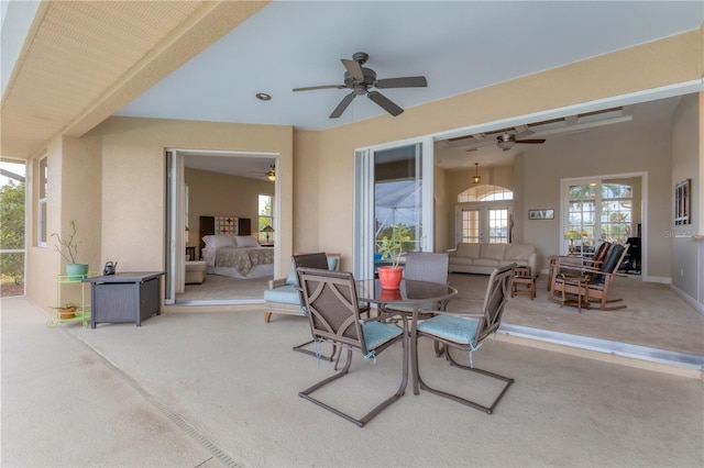 view of patio / terrace with ceiling fan and outdoor lounge area