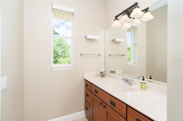 116 Hercules Dr, Rotonda West, FL 33947 - bathroom featuring vanity and baseboards