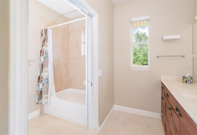 116 Hercules Dr, Rotonda West, FL 33947 - full bath with vanity, shower / bath combo with shower curtain, and baseboards