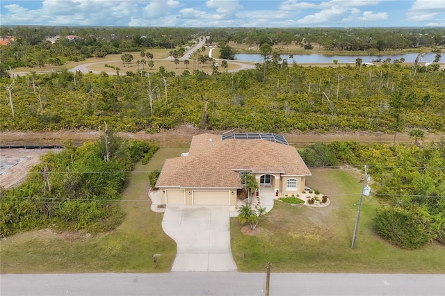 116 Hercules Dr, Rotonda West, FL 33947 - view from above of property featuring a large body of water and a tree filled landscape