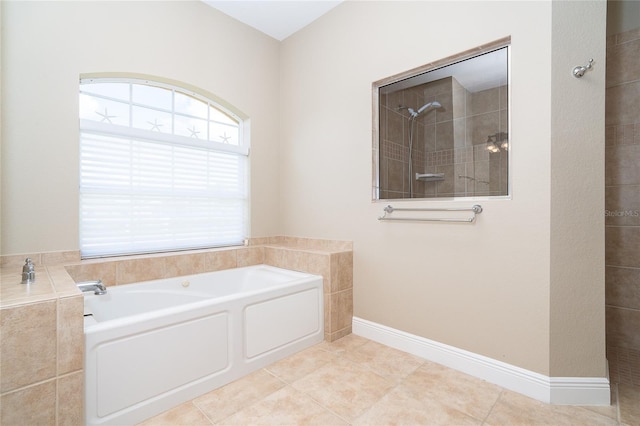 116 Hercules Dr, Rotonda West, FL 33947 - bathroom featuring tiled shower, a bath, and tile patterned floors