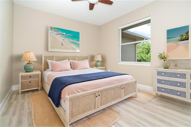 116 Hercules Dr, Rotonda West, FL 33947 - bedroom with wood finished floors, baseboards, and ceiling fan