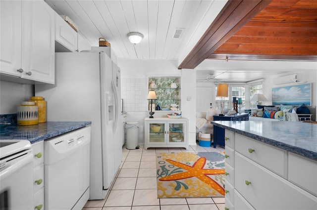 kitchen with light tile patterned floors, wooden ceiling, white cabinetry, dishwasher, and a wall mounted air conditioner