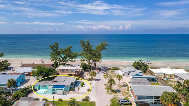 bird's eye view with a view of the beach and a water view