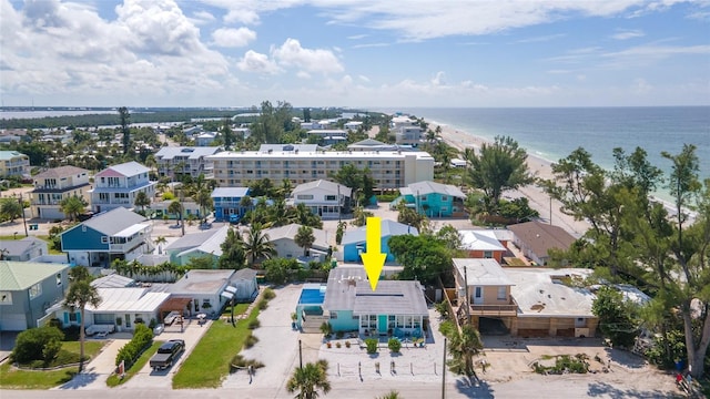 birds eye view of property featuring a residential view and a water view