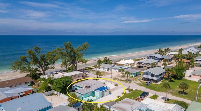 bird's eye view with a beach view, a residential view, and a water view