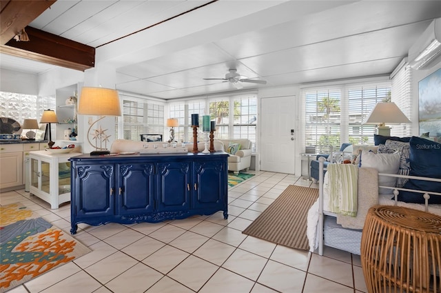 kitchen with blue cabinetry, light tile patterned floors, open floor plan, and an AC wall unit