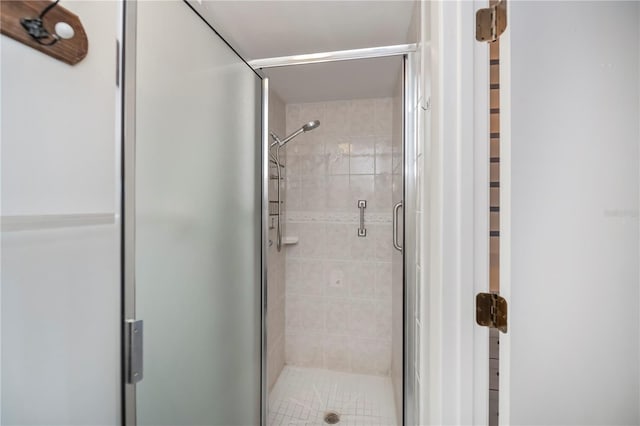 bathroom featuring an enclosed shower