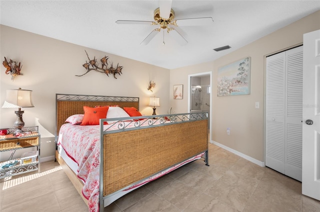 bedroom featuring ensuite bathroom, a closet, and ceiling fan