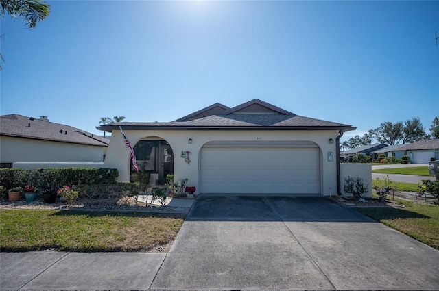 ranch-style home with a garage