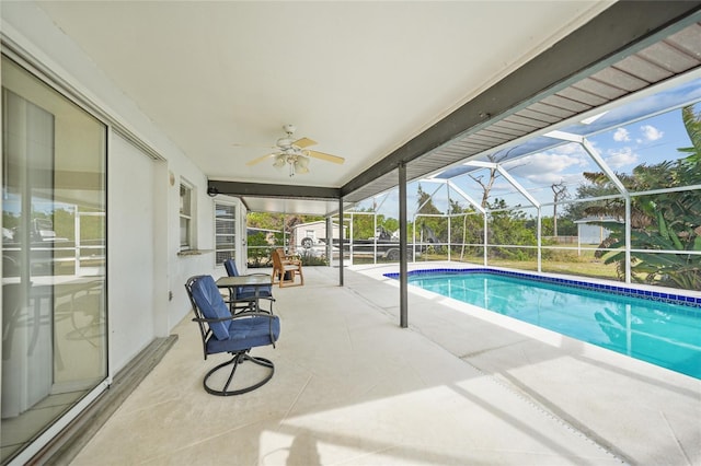 view of pool featuring a lanai and a patio