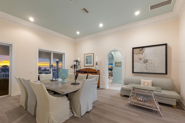 dining area with light hardwood / wood-style floors