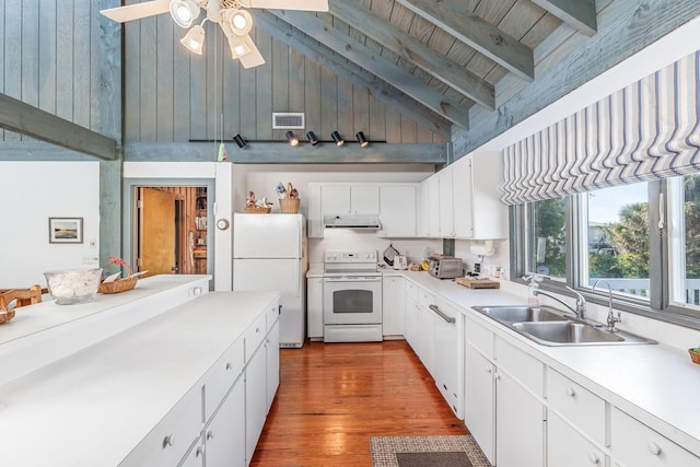 kitchen featuring white appliances, wooden ceiling, high vaulted ceiling, beam ceiling, and sink