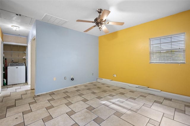 empty room with ceiling fan and washer / clothes dryer