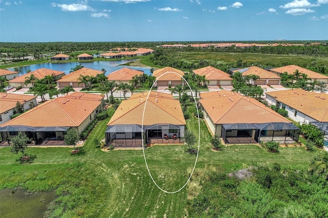 drone / aerial view featuring a water view