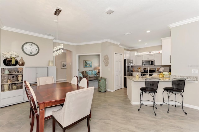 tiled dining room with crown molding