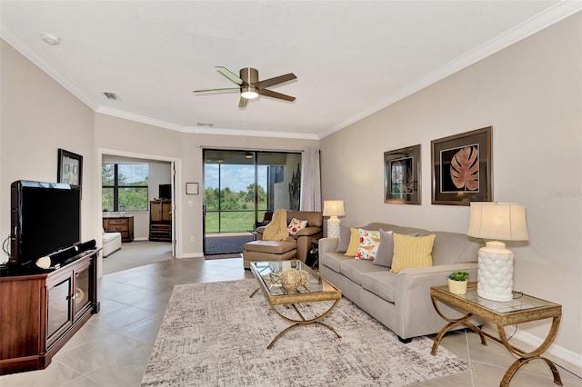 tiled living room with ceiling fan and crown molding