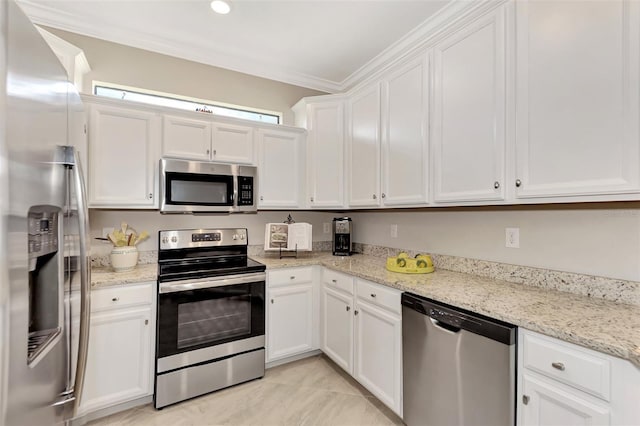 kitchen with appliances with stainless steel finishes, white cabinets, and light stone countertops