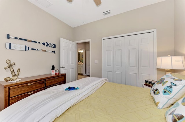 bedroom with ceiling fan and a closet