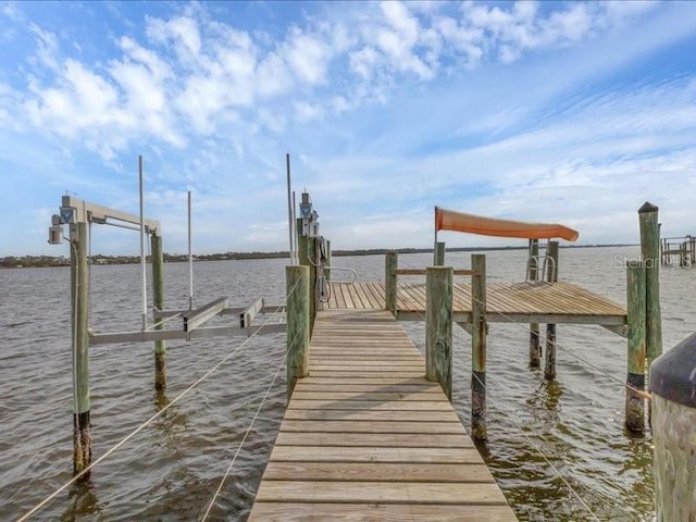 view of dock with a water view