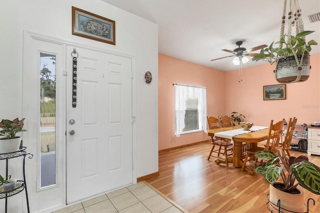 entrance foyer with light hardwood / wood-style flooring and ceiling fan