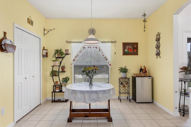 interior space with light tile patterned floors