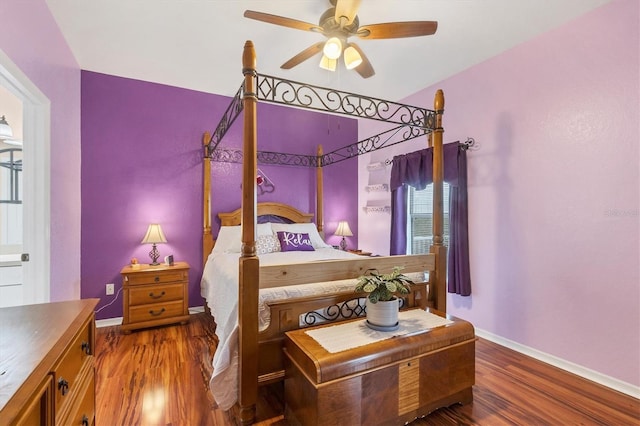 bedroom with hardwood / wood-style flooring and ceiling fan