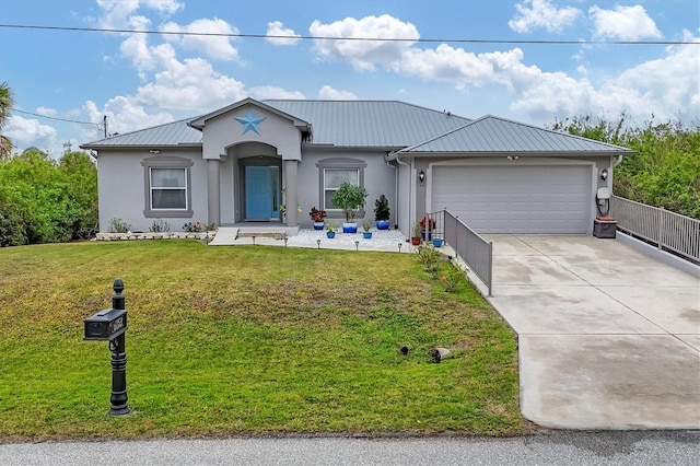 view of front of property featuring a garage and a front yard