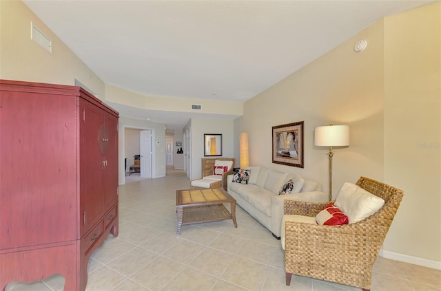 living room featuring light tile patterned flooring