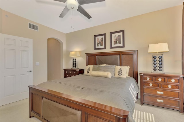 bedroom with light colored carpet and ceiling fan