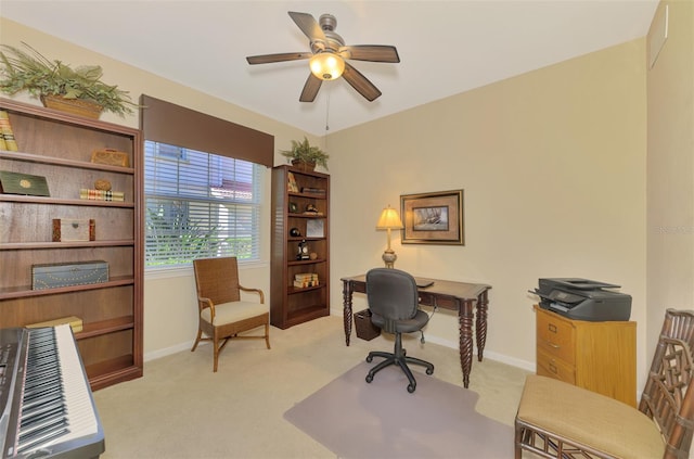 office area with ceiling fan and light colored carpet