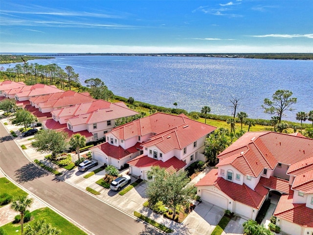 drone / aerial view with a water view