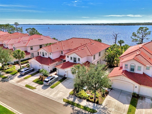 aerial view featuring a water view