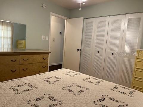 unfurnished bedroom with a closet