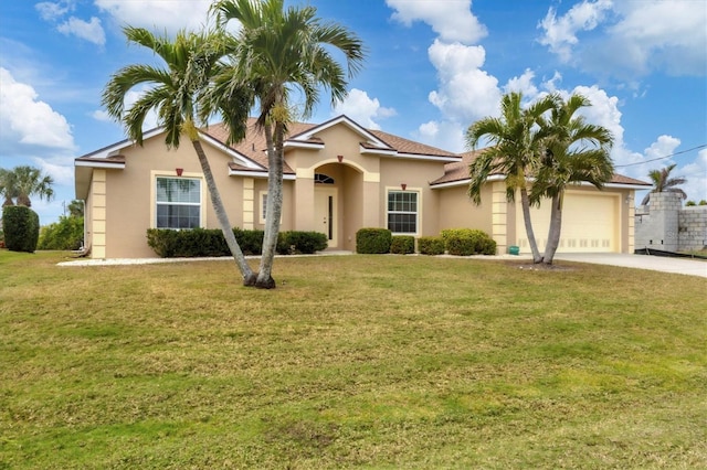 view of front of house with a garage and a front yard