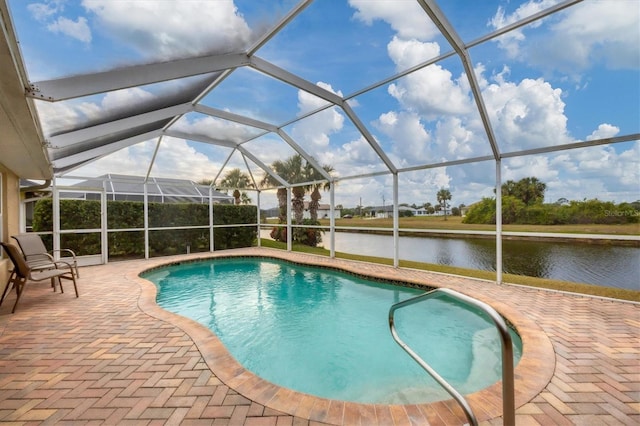 view of swimming pool with a lanai, a water view, and a patio