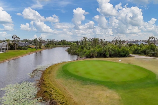 surrounding community featuring a water view