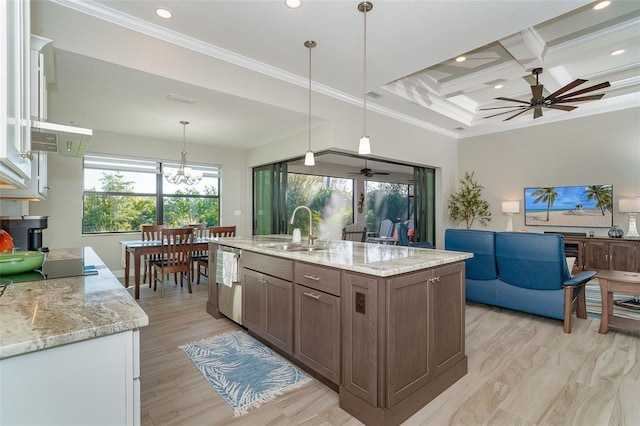 kitchen with stainless steel dishwasher, pendant lighting, beam ceiling, coffered ceiling, and sink