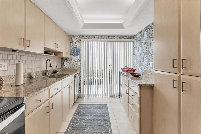 kitchen with dishwasher, a raised ceiling, sink, light tile patterned floors, and light stone counters