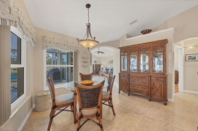 dining area with light tile patterned flooring